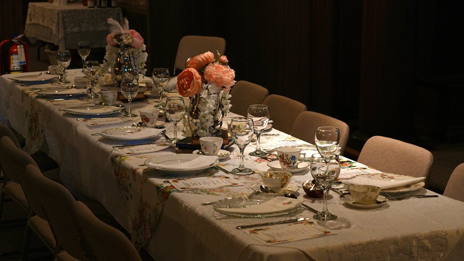 A table laid with vintage china and crystal from Rabbit Hole, set for afternoon tea