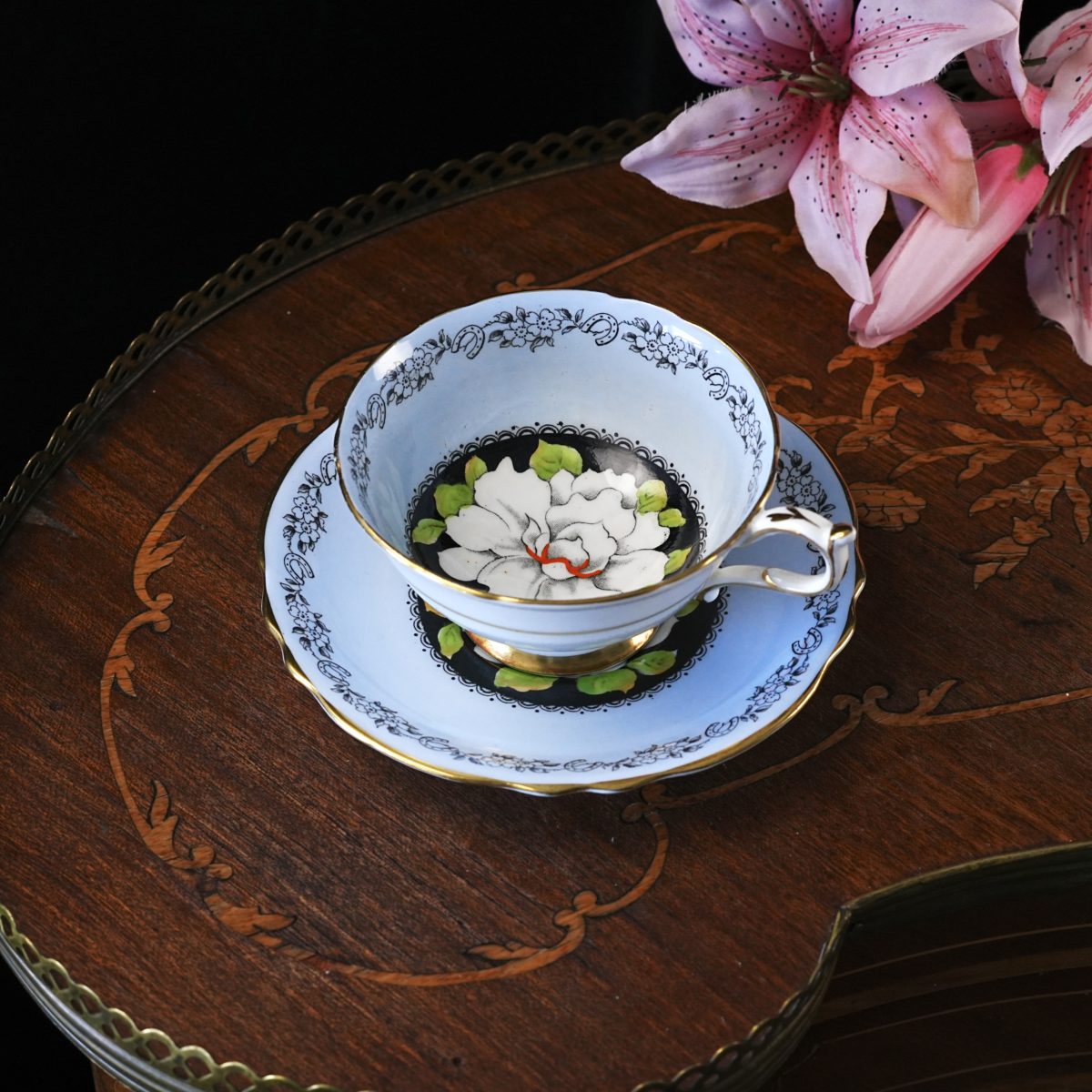 Vintage Paragon Gardenia Teacup & Saucer – White Bloom on Black, Powder Blue, Lucky Horseshoe Border, Double Royal Warrant, England 1940s
