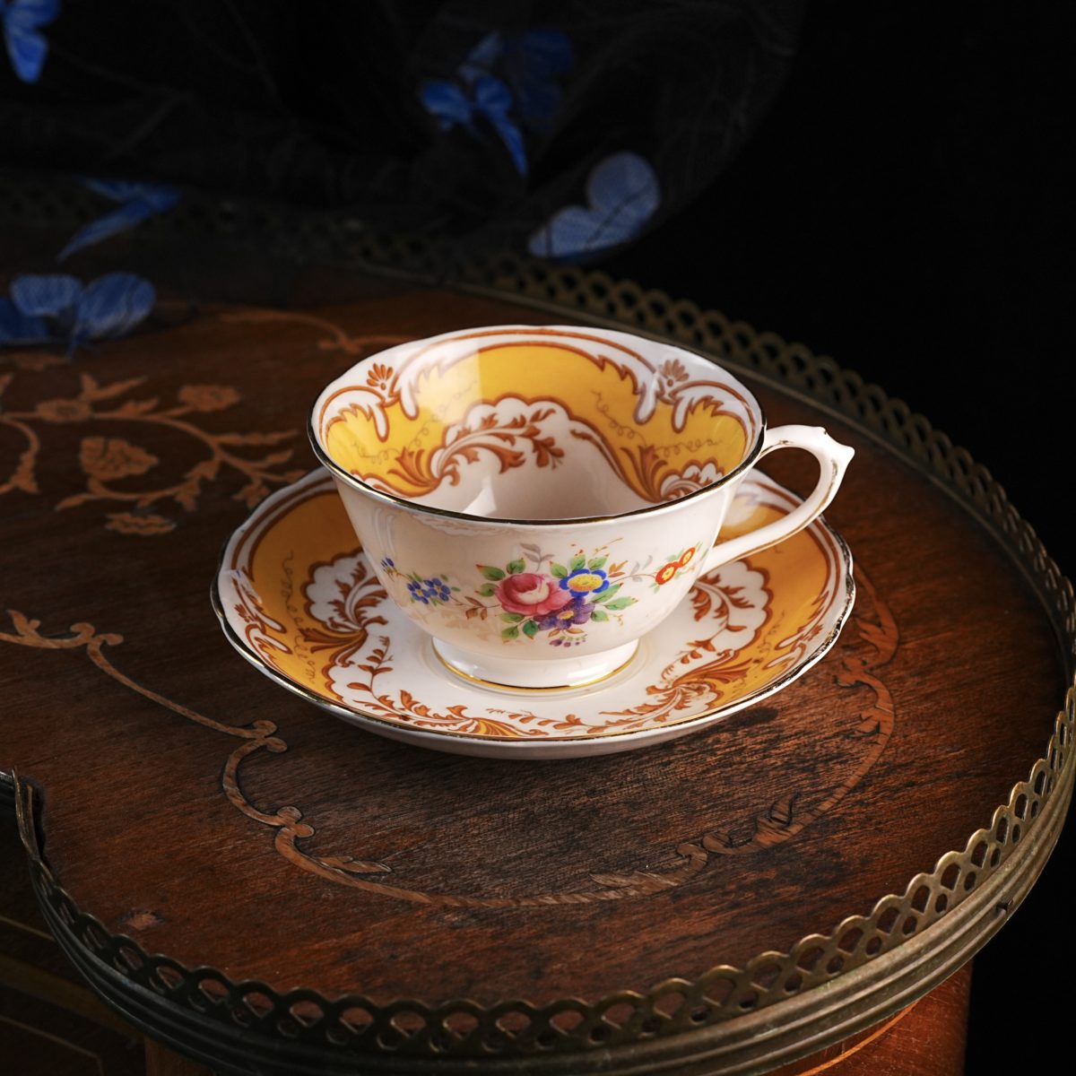 Vintage Plant Tuscan Teacup And Saucer – Deep Yellow Ground, Ochre Scrollwork, Hand Coloured Bouquet, Winged Crown Mark, England 1930s