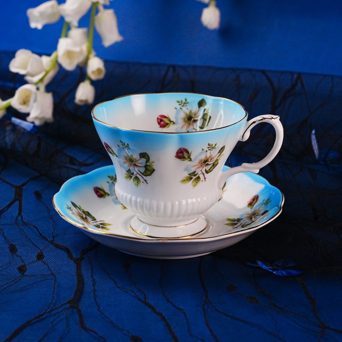 Vintage Royal Albert Blossom Teacup & Saucer – Hand-Painted Daisies, Blue Gradient Trim, Montrose Shape, Fine Bone China, England 1950s–1960s